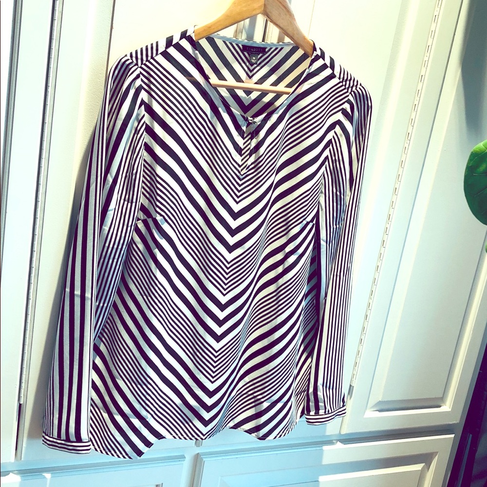 White and black blouse, never worn.
